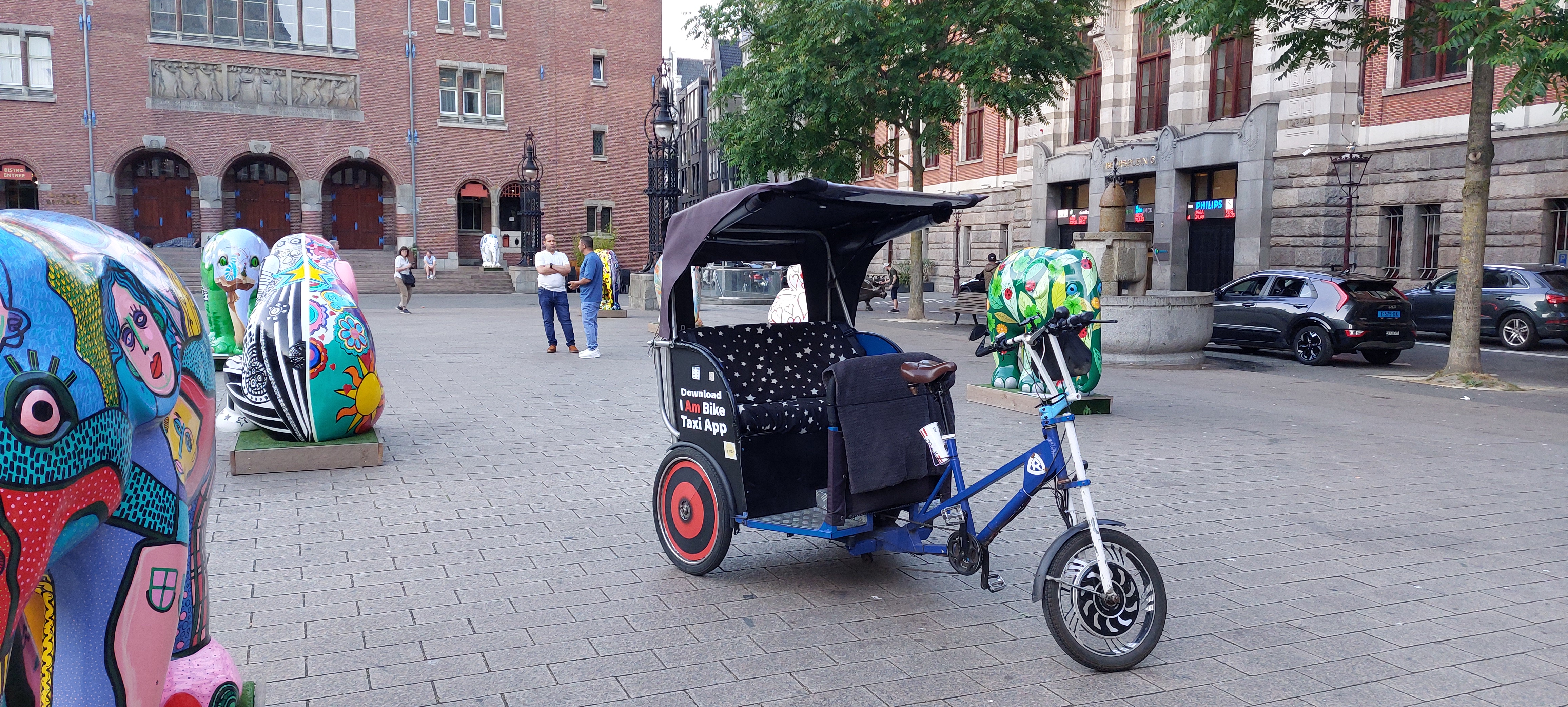 Riksza Green Planet Taxi z pasażerami